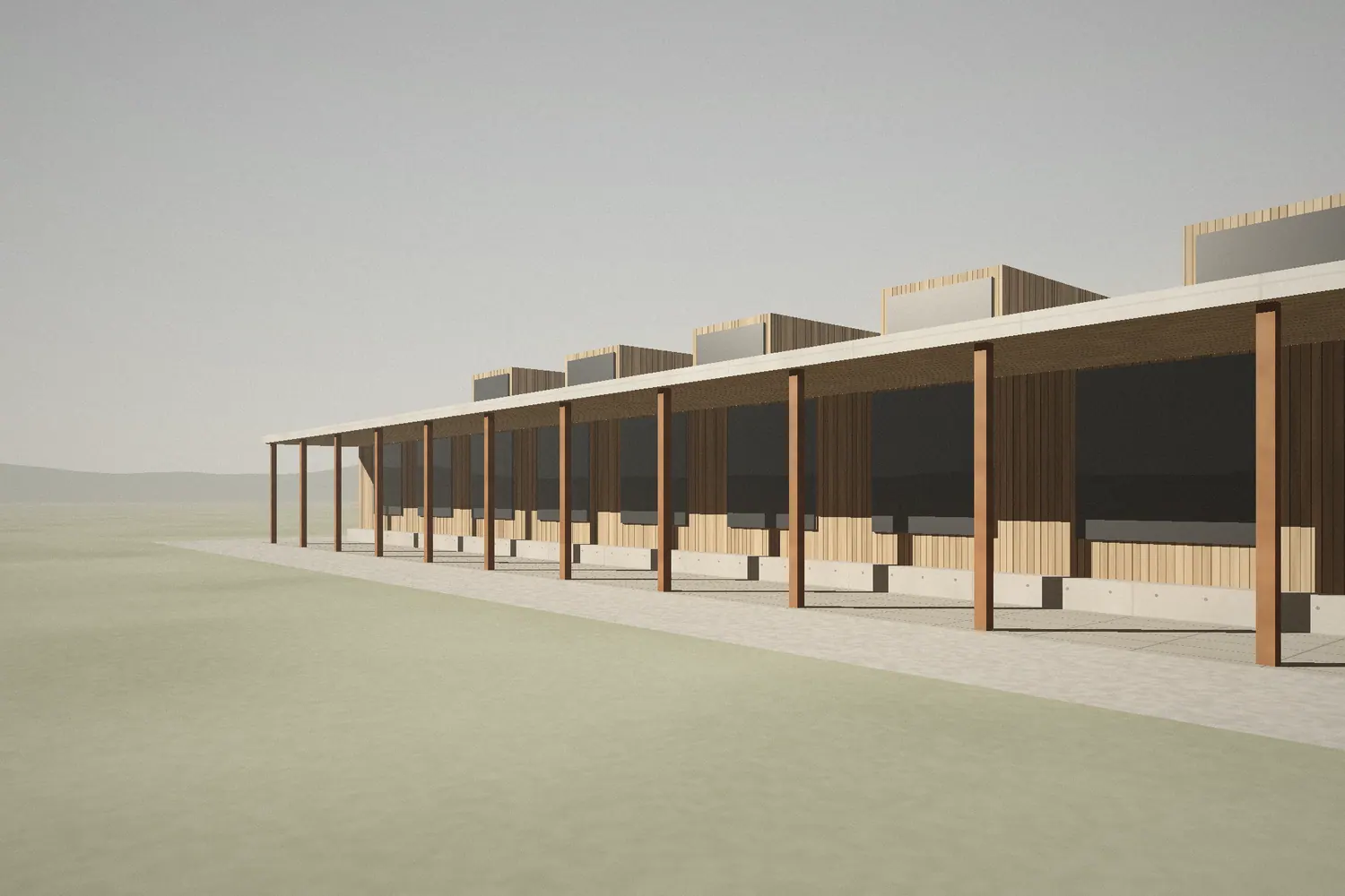 Groupe scolaire bas en bois, sheds en toiture et préau sur poteaux d'acier.